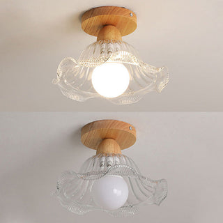 Scandinavian ceiling lamp with wood and glass shade installed