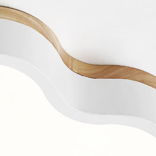 Cloud design ceiling fixture in living room, soft LED ambient light