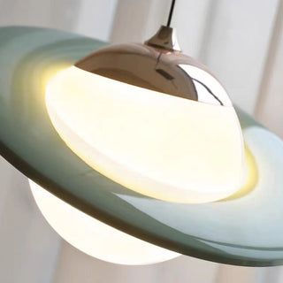 Glass planet pendant in interior — colorful modern ceiling lamp
