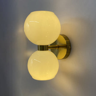 Two head glass iron modern wall sconce detail — lamp