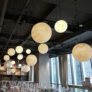 Round moon floor lamp wide view — resin dimmable warm