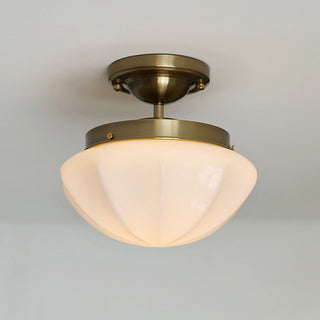 Vintage milky white ceiling light close-up, frosted glass fixture
