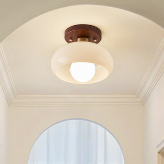 Vintage French glass ceiling fixture in hallway, white wood
