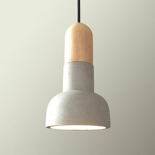 Concrete pendant close-up — loft wood accent hanging lamp