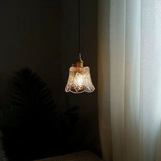 Mini clear glass pendant in interior — vintage adjustable ceiling lamp