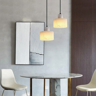 Industrial marble pendant in interior — white adjustable ceiling lamp