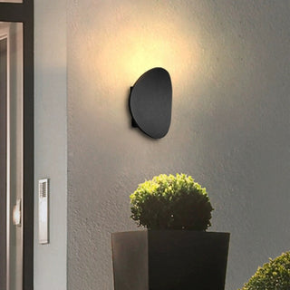 Disc aluminum LED wall sconce detail — modern soft diffused