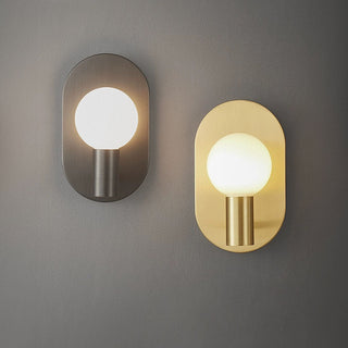 Warm brass Scandinavian bedside wall lamp ambient — sconce