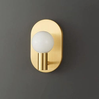 Scandinavian brass bedside wall light — warm brass finish sconce