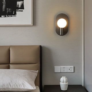 Brass warm finish Scandinavian wall sconce detail — bedside lamp