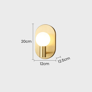 Scandinavian brass bedside wall sconce in bedroom — warm lamp