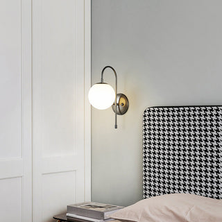 Brass glass ball copper wall sconce detail — vintage lamp