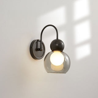 Modern rotatable wall sconce brass glass — mid-century living room