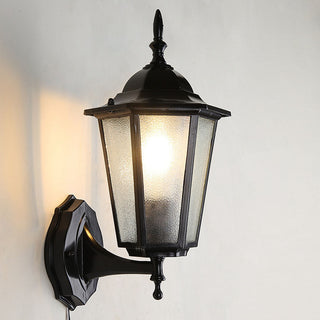 Vintage garden wall sconce clear glass close-up — retro lamp