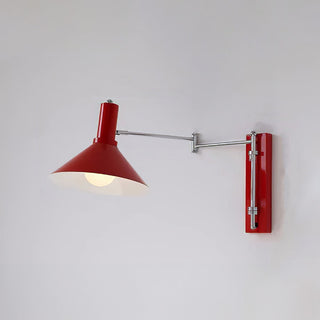 Rotatable iron Bauhaus wall lamp illuminated — metal glass