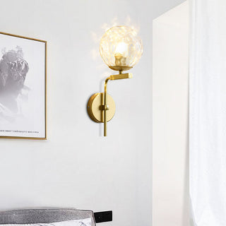 Glass ball Nordic wall lamp close-up — black gold base sconce