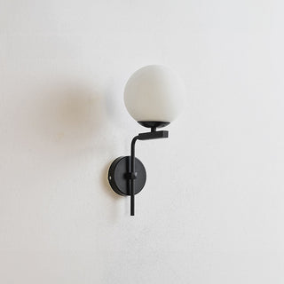 Nordic glass ball wall sconce in living room — black gold base