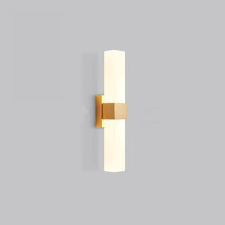 Metal prismatic wall sconce detail — minimalist LED warm light