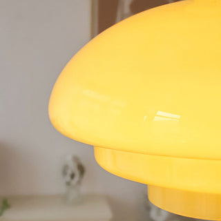 Three-layer glass pendant lamp detail — yellow Bauhaus dining