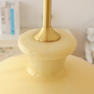 Bauhaus yellow pendant in dining room — three-layer glass ceiling