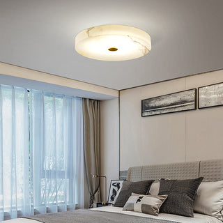 White marble ceiling light close-up, luxury flush mount detail