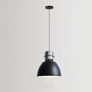 Small LED pendant hanging in Scandinavian dining interior