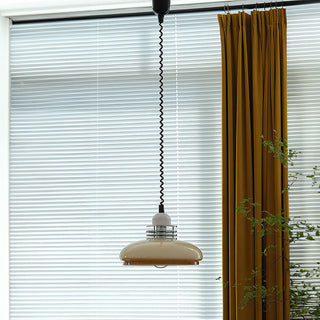 Bauhaus brown glass pendant styled — stylish living room lamp