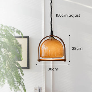 Orange glass ball pendant top view — mid-century hanging lamp