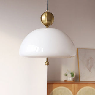 Creamy glass pendant in interior — classic vintage dining fixture