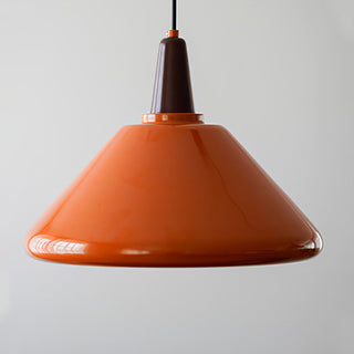 Orange pendant close-up — Bauhaus kitchen island hanging lamp