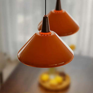 Bauhaus orange pendant detail — kitchen island hanging fixture