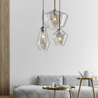 Clear rod pendant styled in room — minimalist hanging glass light