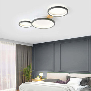 Iron wood LED ceiling fixture in bedroom, modern round design