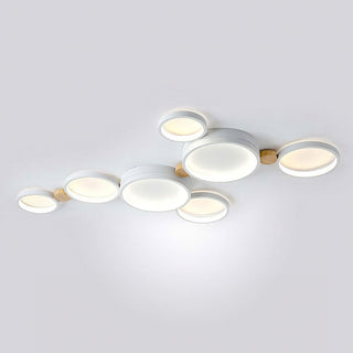 Modern iron wood ceiling light close-up, round LED bedroom