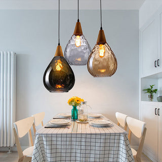 Teardrop pendant side angle — amber vintage glass ceiling lamp