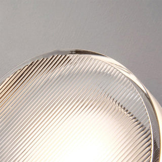 Acrylic designer LED wall lamp close-up — modern sleek