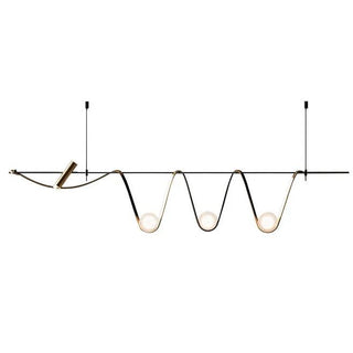 Síre handcrafted glass and metal pendant light for ambient room lighting