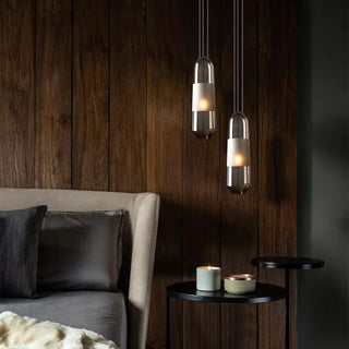 Capsule pendant lamp detail — glass sleek adjustable fixture