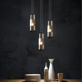 Glass capsule pendant side view — sleek adjustable ceiling lamp