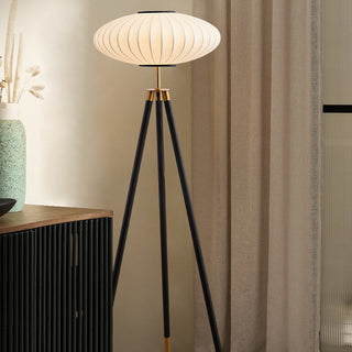 Classical silk floor lamp illuminated — elegant iron warm