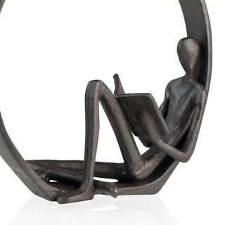 iron reader sculpture elegant metal book figurine black brown decor close-up