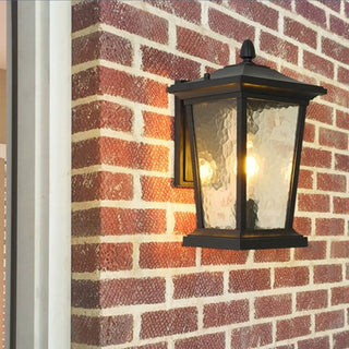 Farmhouse outdoor sconce detail — glass shade aluminum wall lamp