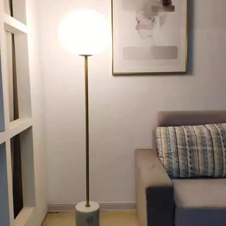 Modern globe floor lamp wide — marble glass brass