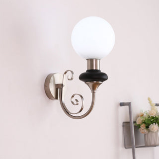 Vintage French wall lamp close-up — glass shade retro fixture