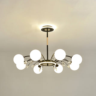 Gold raindrop chandelier side view — luxury glass ceiling warm