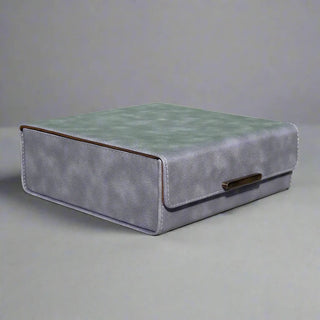 vegan leather desk organizer 7-piece gray champagne gold accents trays angle view