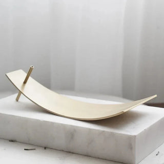 metal incense holder earthworks handcrafted bronze incense burner tray organic curved design close-up