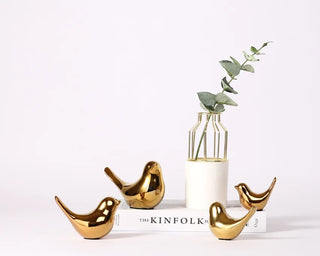 golden bird figure handmade enamel ceramic bird sculpture elegant home decor top view