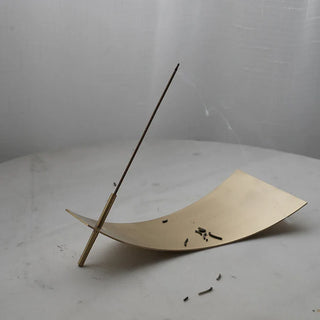 metal incense holder earthworks handcrafted bronze incense burner tray organic curved design side view