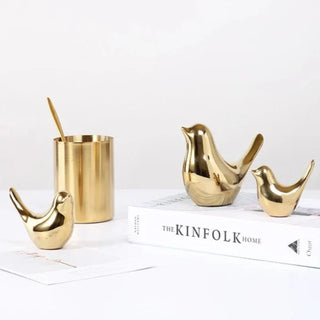 golden bird figure handmade enamel ceramic bird sculpture elegant home decor angle view